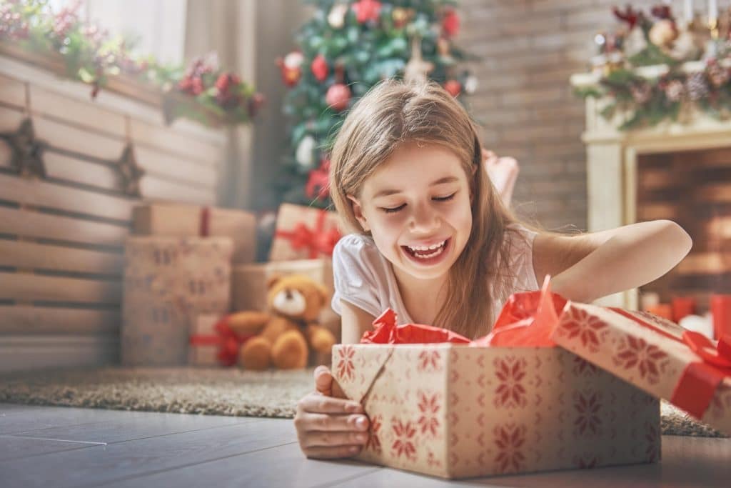 Girl opening gift