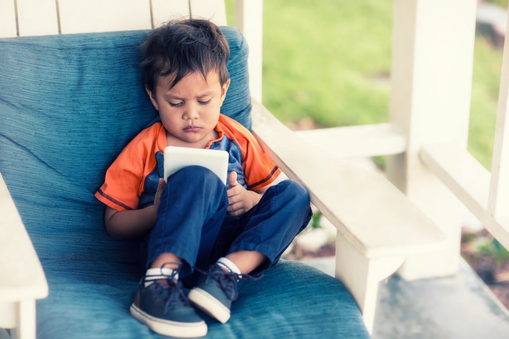 Toddler on a device