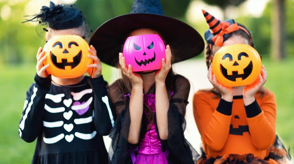 Kids in Halloween costumes