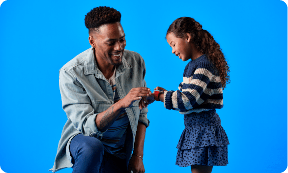 A parent assisting their child with their gabb watch features